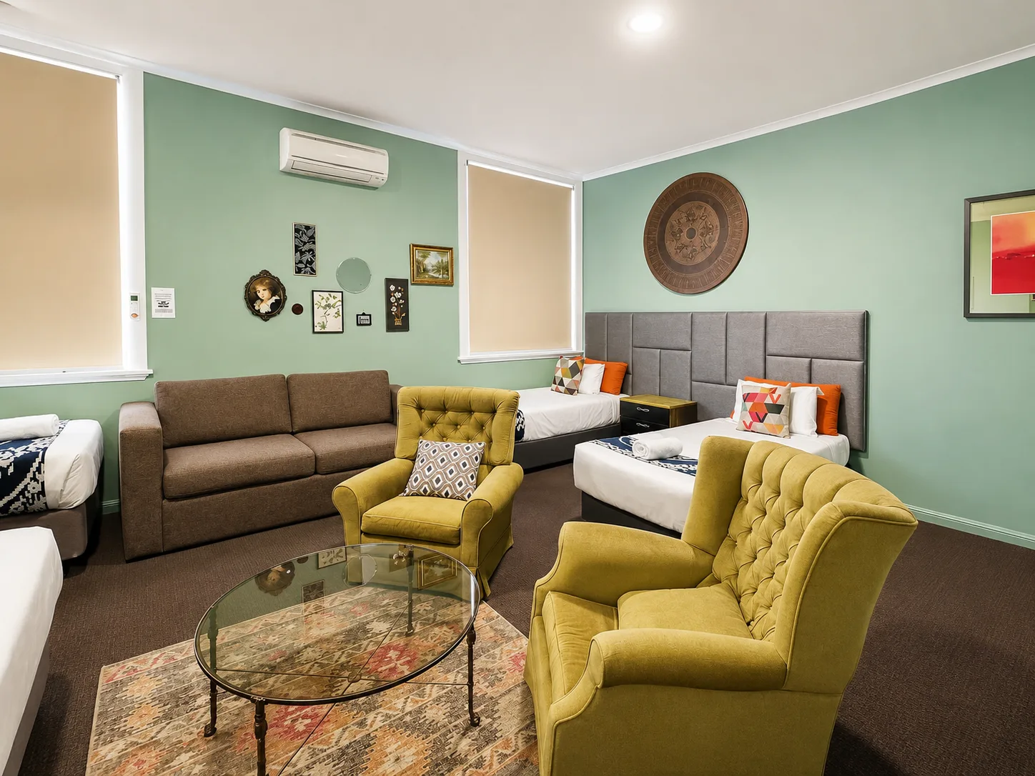 Guest lounge seating area — Family Room at Vine Valley Inn Cessnock