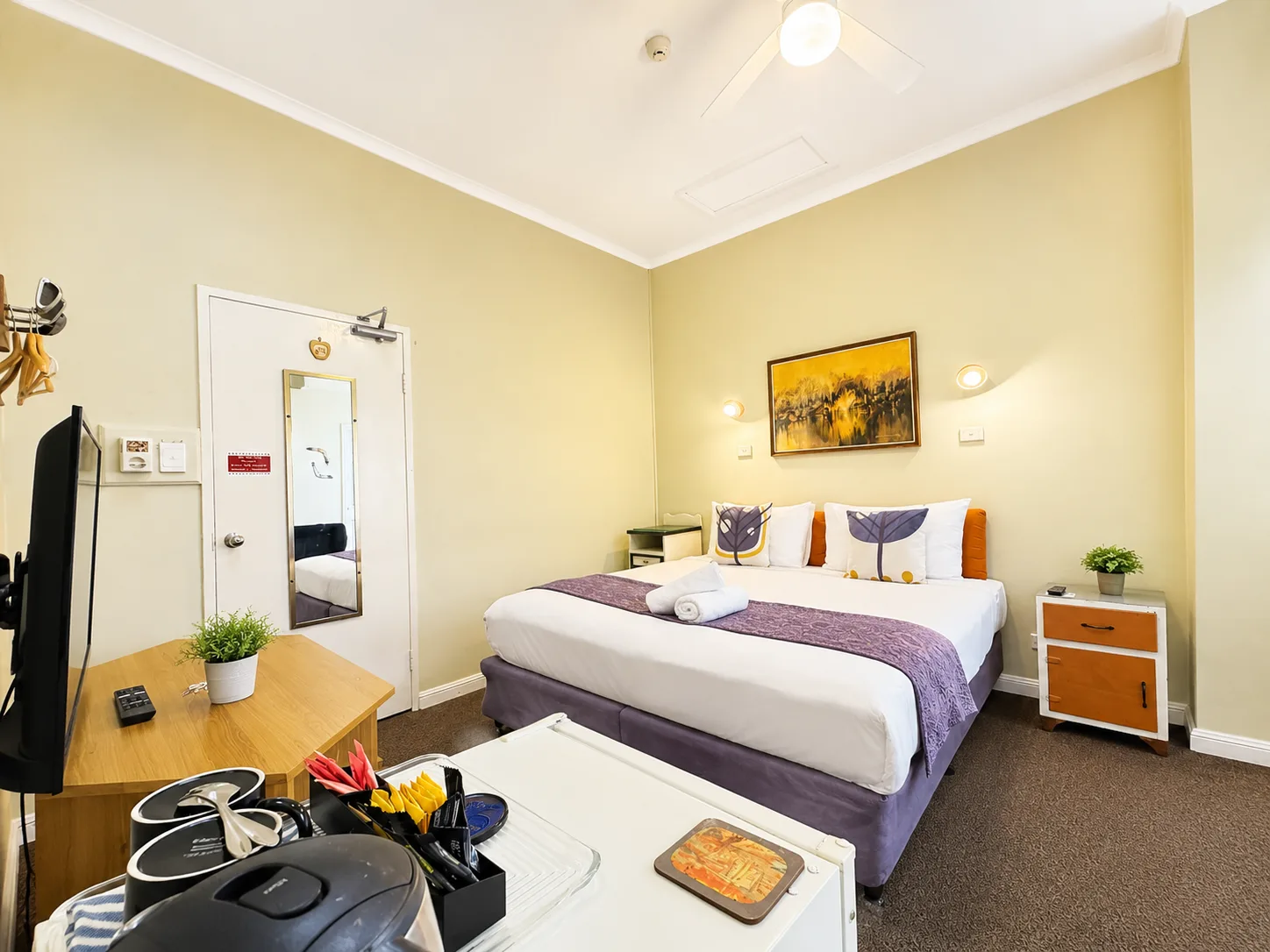 King bedroom with tea station — King Room at Vine Valley Inn Cessnock