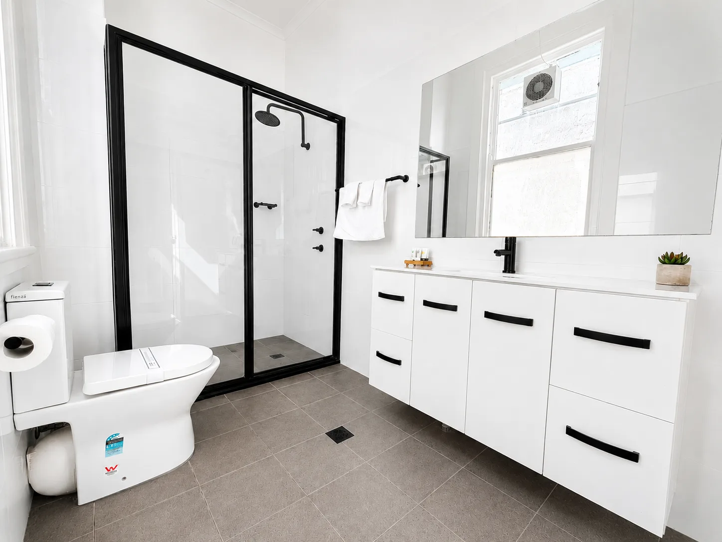 Ensuite shower and vanity — King Room at Vine Valley Inn Cessnock