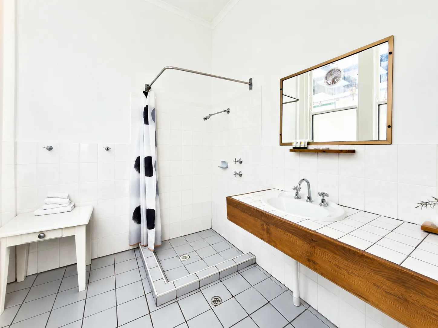 Bathroom with shower and timber vanity — Queen Room at Vine Valley Inn Cessnock